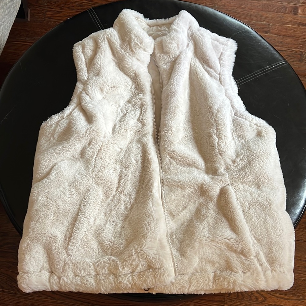 Reversible faux fur and down vest